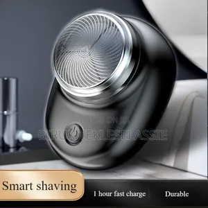 Photo - Mini Pocket Rechargeable Travel Shaver