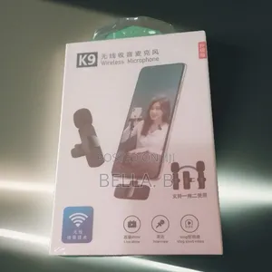 Photo -  Wireless Microphone: Ideal for Outdoor Events.