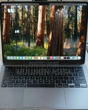 Photo - New Laptop Apple MacBook Air 2022 M2 8GB Intel Core M2 SSD 256GB