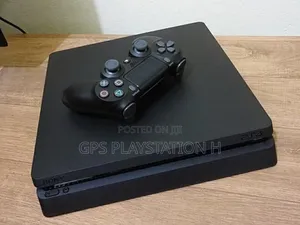 Photo - Playstation 4 Slim Fifa 25 ጨምሮ 5 ጌም