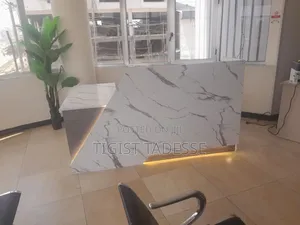 Photo - Reception Table Designed to Create a Welcoming First Impression.