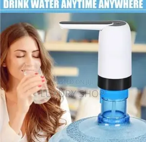 Photo - ከጃር ላይ ዉሀ መቅጃ Water Dispenser
