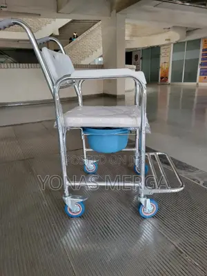 Photo - Toilet Chair痹∞Commode Chair።那smooth Mobility Safety Locks: Equipped