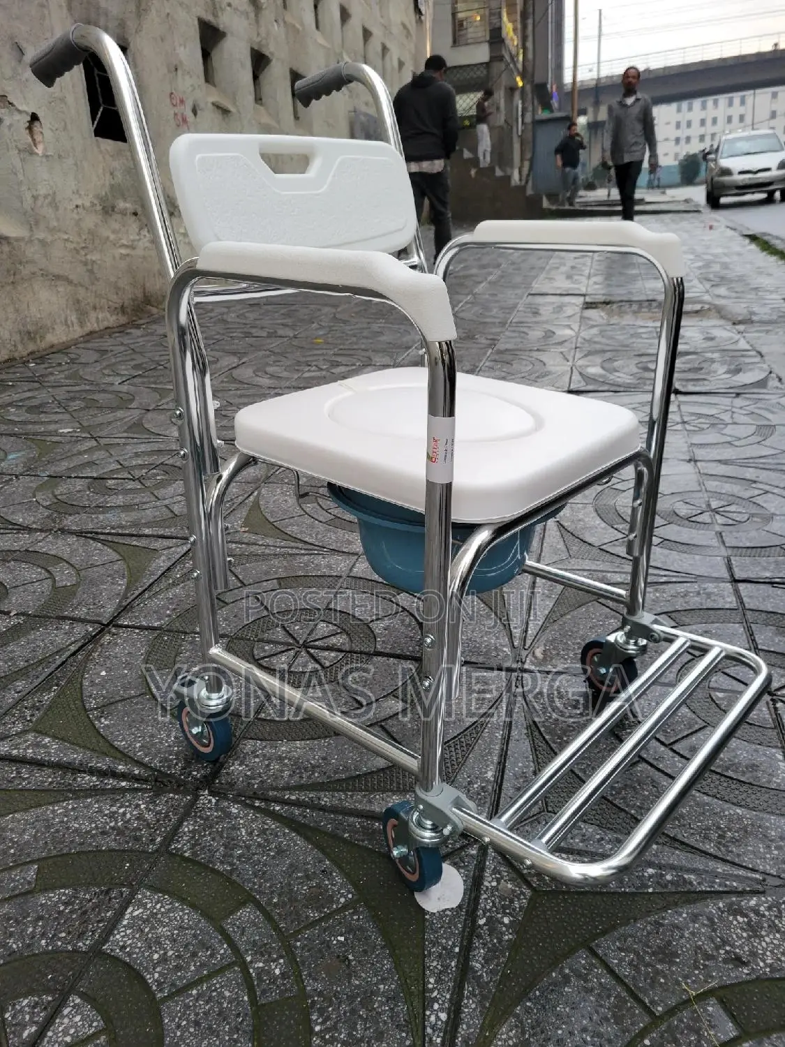 Wheeled Commode Chair戒πdirectly Over a Toilet for Safer Toileting