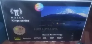 Photo - Rolex 65 Inchi Double Glass Smart 2025 Tv