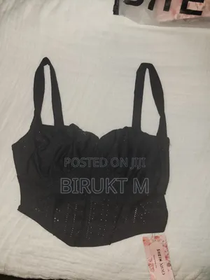 Black Top. Also Available In Red And Nude