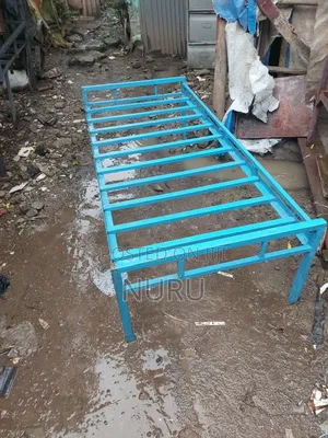 Single ብረት አልጋ