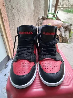 Photo - Air Jordan Access Bred Jumpman