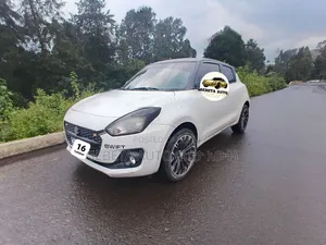 Photo - Suzuki Swift 2022 White