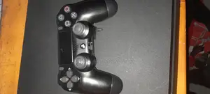 Photo - Ps4 Slim – 2 Original Joysticks + Fifa 25 & 5 More Games