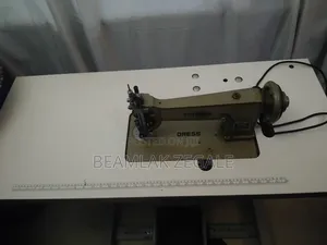 Photo - Sewing Dress Machine የጥልፍ ዲዛይን ማሽን