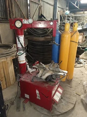 Photo - Tire Changer (Rim Clamp) የጎማ ቸርኬ መቀየሪያ ማሽን