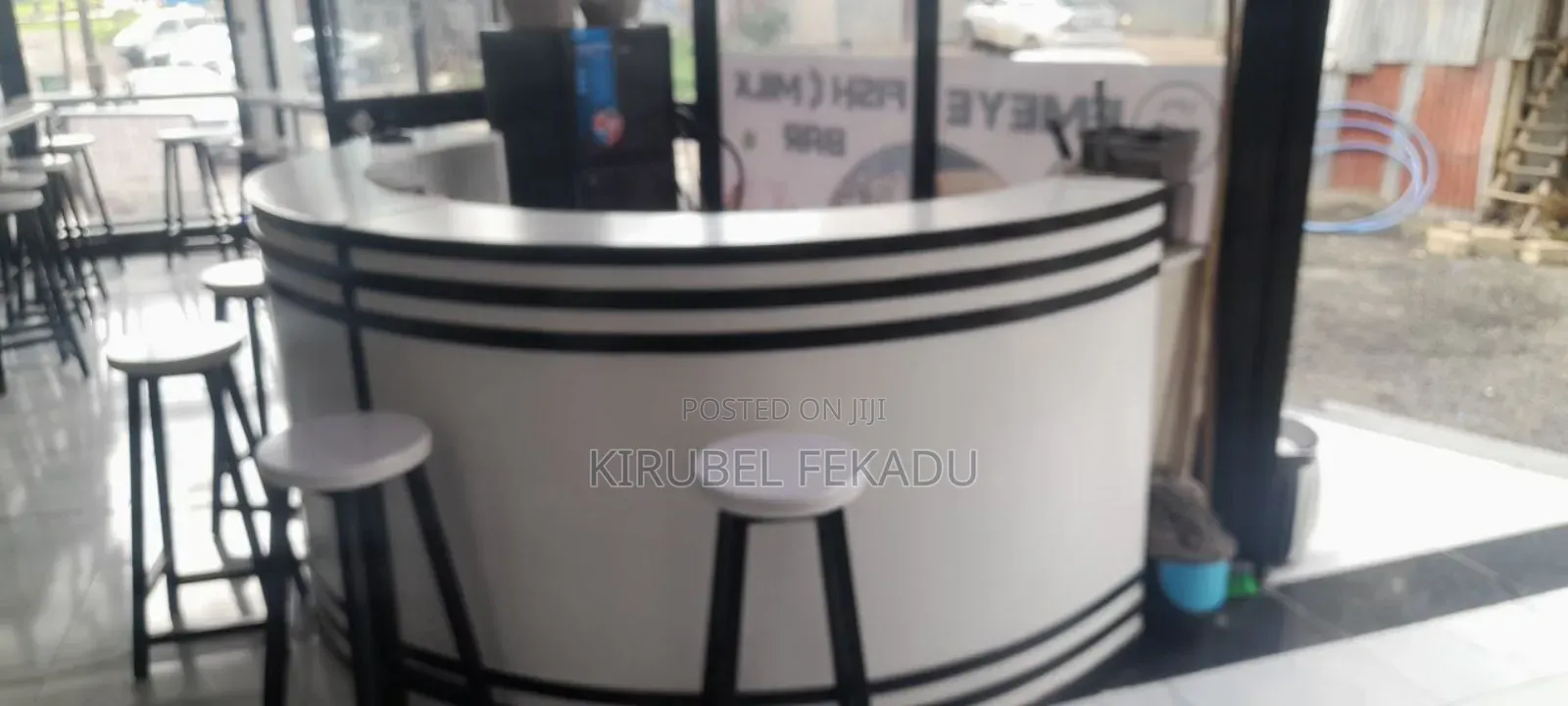 Cafe Bar and Chairs With Their Tables