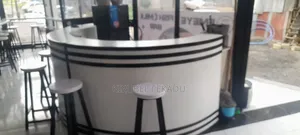 Cafe Bar and Chairs With Their Tables