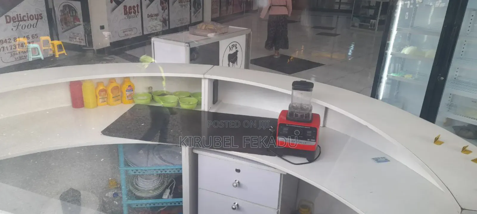 Cafe Bar and Chairs With Their Tables