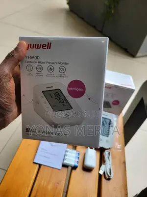 Photo - Blood Pressure Monitor两፲ Accurate Convenient Monitoring耳疹bp Apparatus