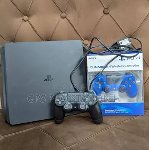 Photo - Playstation 4 Slim With Fifa 26High Quality