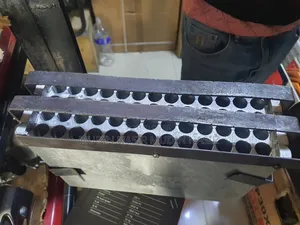 Photo - ሻማ መምረቻ ማሽን