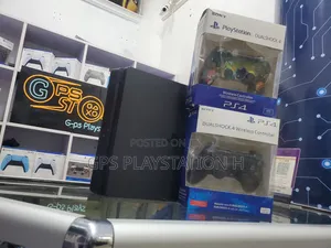 Photo - Playstation 4 Slim Jealbreak Ps Fifa 26 and More Than 10 Games