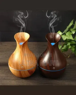 Photo - Ultrasonic Mini Aroma Humidifier