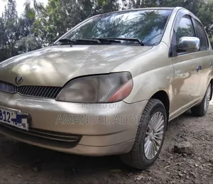 Photo - Toyota Platz 2001 Gold