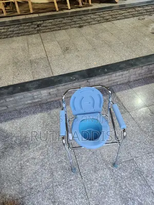Photo - Commode Chair痛楚brand New Mika Seat Commode Chair旯了poty Chair Medical
