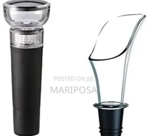 Photo - Wine Pourer And Cork Stoppers