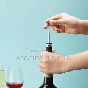 Photo - Wine Pourer and Cork Stoppers