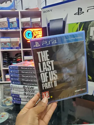 Photo - Playstation 4 Last of Us 2 Cd Game