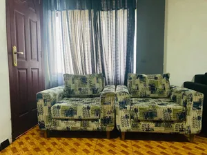 Photo - 2 ባለ አንድ መቀመጫ ሶፋ