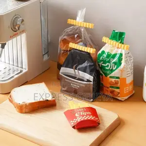 Fries Clip የታሸጉ ምግቦችን ከፍተን ከተጠቀምን በኋላ መልሰን ለማሸግ የሚረዳ