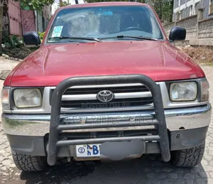 Photo - Toyota Hilux 1998 Red