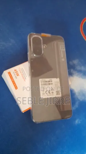 Photo - New Infinix Smart 10 128 GB Bronze