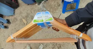 Photo - የልብስ መስቀያ የእንጨት/Wooden Clothes Hangers.