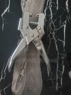 Photo - Paper Bag Puncher መጨፍለቂያ