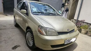 Photo - Toyota Platz 2001 Gold