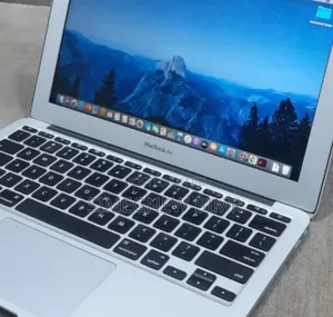 Photo - New Apple MacBook Air 2025 M4 15-Inch 4GB Intel Core I5 SSD 128GB