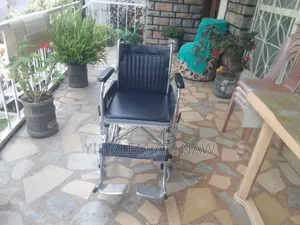 Photo - Portable Commode Wheelchair – Easy-to-Use Chair for Disabled”