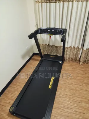 Photo - Reebok የመሮጫ ማሽን