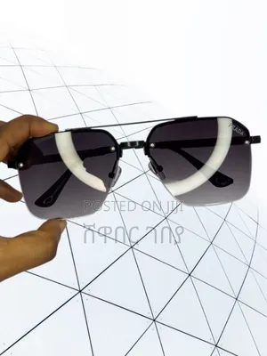 Photo - Prada and Gucci Sunglasses