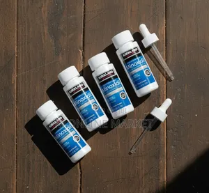 Photo - For Men's Hair Regrowth Minoxidil Reactivates Dormant Follicles.