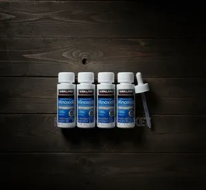 Photo - For Men's Hair Regrowth Minoxidil Is the #1 Topical Solution Used.