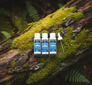 Photo - For Men's Hair Regrowth Minoxidil Is a Daily Essential for Your Scalp.