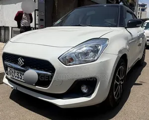 Photo - Suzuki Swift 2022 White