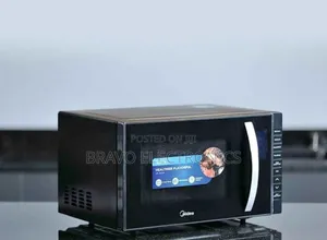 Photo - Midea Microwave 23l – Fast, Easy ሚዲያ ማይክሮዌቭ 23 ሊትር