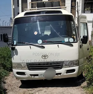Photo - Toyota Coaster 2010 White