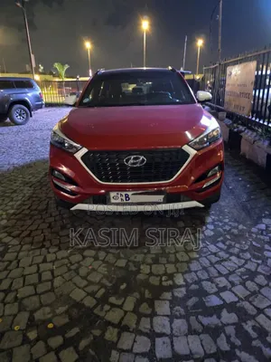 Photo - Hyundai Tucson Limited AWD 2017 Burgundy