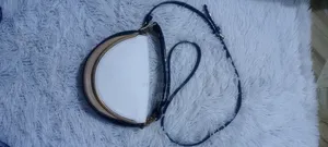 ምንም እንከን የሌለው ጥሬ ቦርሳ ቀለል ላለ አለባበስ ምትሆን ፅድት ያለች ብራንየ ቦርሳ