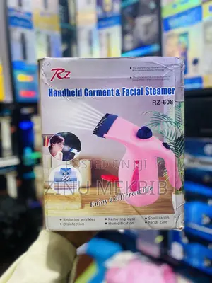 Photo - Handheld Garment And Facial Steam