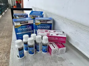 Photo - Minoxidil Hairgrow Oil and Derma Roller